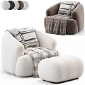 Cozy Beige Single Sofa With Striped Pillow Plaid Throw Blanket And Matching Ottoman