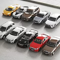Display of Multiple Car Models in Various Colors and Different Styles Arranged Together
