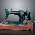Vintage Blue Sewing Machine With Rustic Finish On Wooden Base