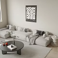 Modern Living Room Featuring Light Gray Three Seater Sofa With Pillows And Decorative Wall Art