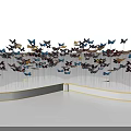 Colorful Butterfly Art Installation With White Base And Wing Shaped Design