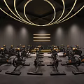 Modern Gym Studio With Multiple Spin Bikes And Circular Yellow Lighting