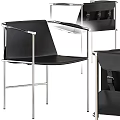 Black Leisure Chair With Sleek Metal Frame And Modern Design