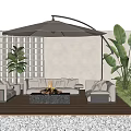 Modern Outdoor Sofa With Fire Pit Coffee Table Umbrella And Plants On Wooden Deck Night