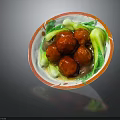 Delicious Braised Red Meatballs with Fresh Green Vegetables and Sauce on Ceramic Plate
