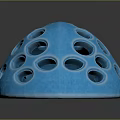 Blue Weapon With Multiple Circular Holes And Helmet Like Protective Structure