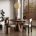 Round Wooden Dining Table With Modern Chairs Light Cushions Vase Dried Flowers And Pendant Light