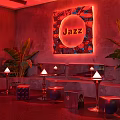 Stylish Jazz Bar Interior With Red Ambiance Decorative Panel Tropical Plants Leather Stools Seating Area