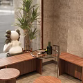 Minimalist Cafe Exterior Design With Wooden Door Concrete Wall Signboard And Green Plant