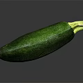 Fresh Green Zucchini Whole Ripe Vegetable with Smooth Skin on Dark Reflective Surface