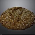 Freshly Baked Round Brown Bread With Oats And Seeds On Crusty Surface