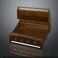 Modern Golden Kitchen Grill Appliance With Lid Control Knobs And Cooking Grate