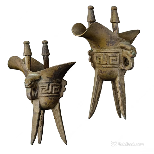 Ancient Bronze Wine Vessels With Carved Patterns And Three Legged Design 3d model 