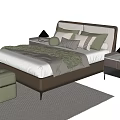 Modern Double Bed With Plush Pillows Cozy Blanket Nightstands Table Lamps Green Stool Neutral Rug