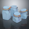 Blue Glass Storage Jars With Orange Seals And Metal Clips For Kitchen Use