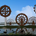 Garden Ornaments Featuring Wooden Water Wheels Lotus Leaves And Pond With Grass