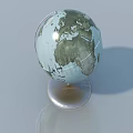 Sleek Blue And Green Globe With Silver Base On Smooth Surface 3d model