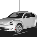 Silver Volkswagen Beetle Car With Classic Design And Black Wheels Parked On Road
