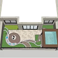 Courtyard Garden Design Featuring Stone Paving Circular Seating And Lush Flower Shrubs