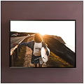 Framed Portrait Painting of Girl with Outstretched Arm Carrying Surfboard at Sunset by Cliff Road