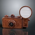 Vintage Copper Colored Computer Camera With Engraved Patterns And Circular Lens