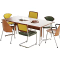 Modern Wooden Table and Chair Set with Colored Seats Metal Legs Book and Fruit Plate