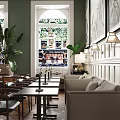 Elegant Restaurant with Large Black and White Botanical Paintings Green Walls White Wainscoting Rattan Furniture