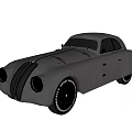 Vintage Silver Classic Car Featuring Streamlined Body Vintage Tires And Elegant Styling