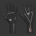 Pearl Jewelry Display On Black Hand Models With Bracelet And Red Tassel Necklace