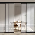Modern Glass Sliding Doors With Black Frame In Dining Area Featuring Wooden Table And Plants