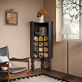 Decorative Black Cabinet With Ornate Patterned Panels Vase Flowers Armchair Floor Lamp Wall Art