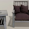 Wooden Table and Chair Set With Comfortable Dark Cushions And Cozy Throw Blanket