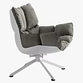 Gray Leisure Chair With Plush Cushions And White Star Shaped Metal Base