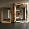 Two Large Mirrors With Natural Wood Frames In Room Featuring Potted Plant And Window