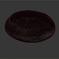 Hand Carved Dark Stone Bowl Shaped Sculpture With Textured Surface