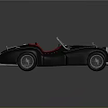 Vintage Convertible Sports Car With Black Body Red Seats And Open Top Design