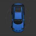 Shiny Blue Sports Car With Large Rear Spoiler And Wide Body Kit