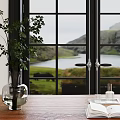 Inflatable Decorative Model Display on Wooden Table by Window with Plant Vase and Mountain Lake View