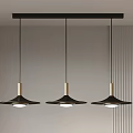 Three Modern Hanging Pendant Lights Featuring Black And Gold Metal Design