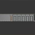 Small Building With Gray Roof Gray Walls Multiple Windows Metal Fence Gate And Stone Foundation