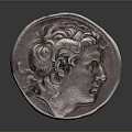 Artistic Ancient Silver Coin Sculpture With Detailed Human Head Carving Design