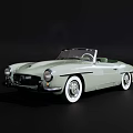 Classic Light Green Open Top Convertible Car With White Wheels And Sleek Design