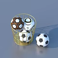 Gold Metal Basket Containing Various Soccer Balls And One Outside