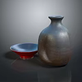 Decorative Ceramic Clay Vase And Red Blue Small Bowl On Dark Glossy Surface
