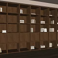 Dark Wooden Bookcase With Multiple Compartments Books And Empty Shelves In Modern Room