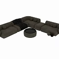 Modern Two Seater Sofa Interior With Round Ottoman And Soft Cushions In Neutral Tones