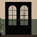 Black Double Doors With Arched Gridded Glass Panels Brass Handles Green Plant Beige Green Walls