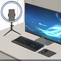 Modern Computer Workstation With Monitor Keyboard Mouse Ring Light Microphone On White Desk