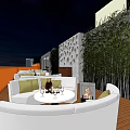 Roof Garden Outdoor Seating Area With White Sofas Round Table Wine Glasses And Bamboo Plants