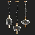 Modern Transparent Glass Pendant Lights With Golden Metal Accents And Various Shapes